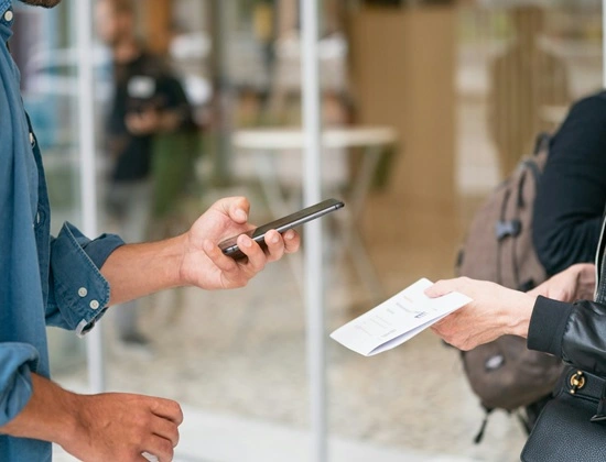 User scanning QR code with a phone